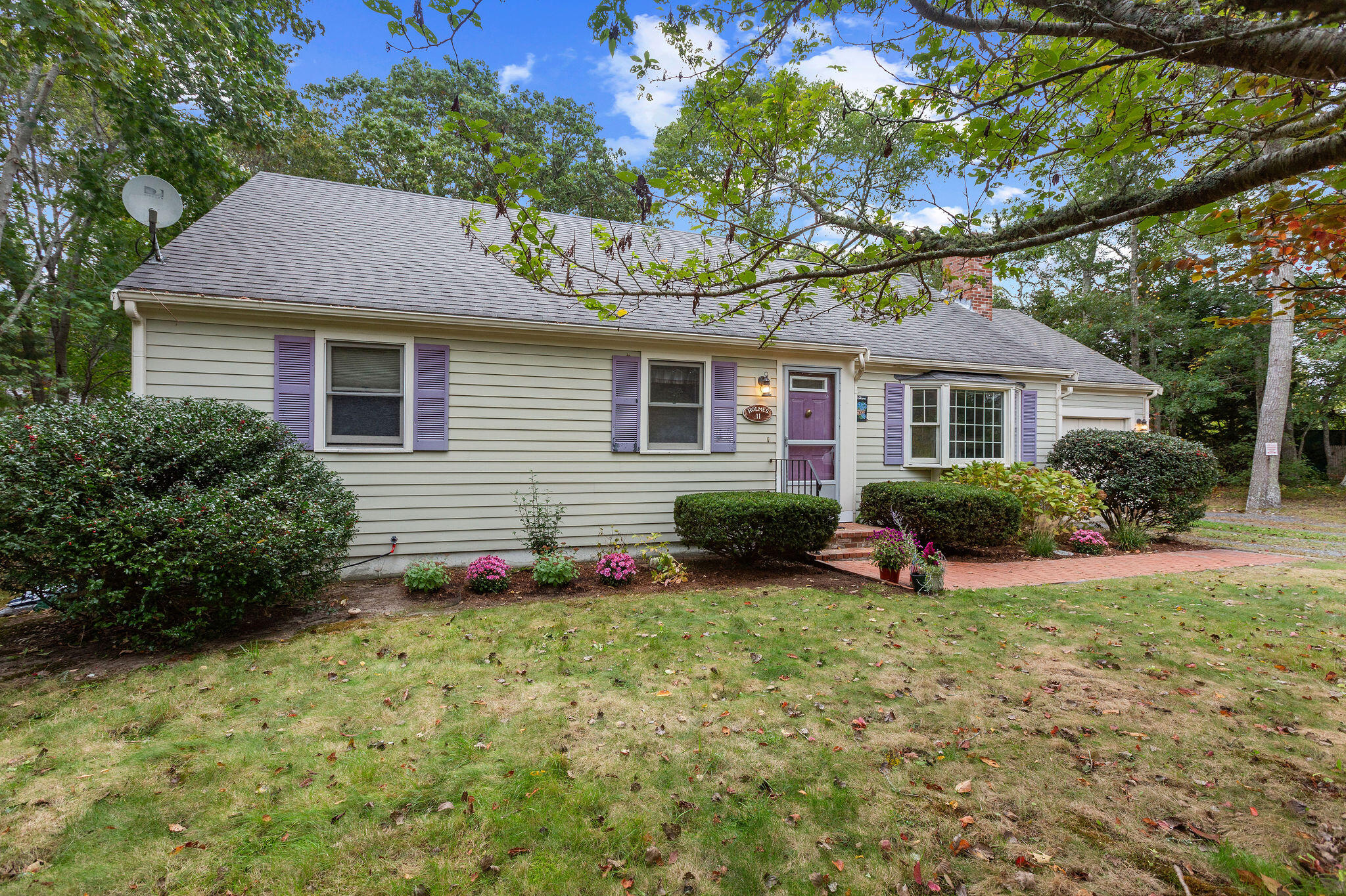 11 Windjammer Road Harwich, MA 02645 - Photo 5 of 29 a view of front of house with a yard