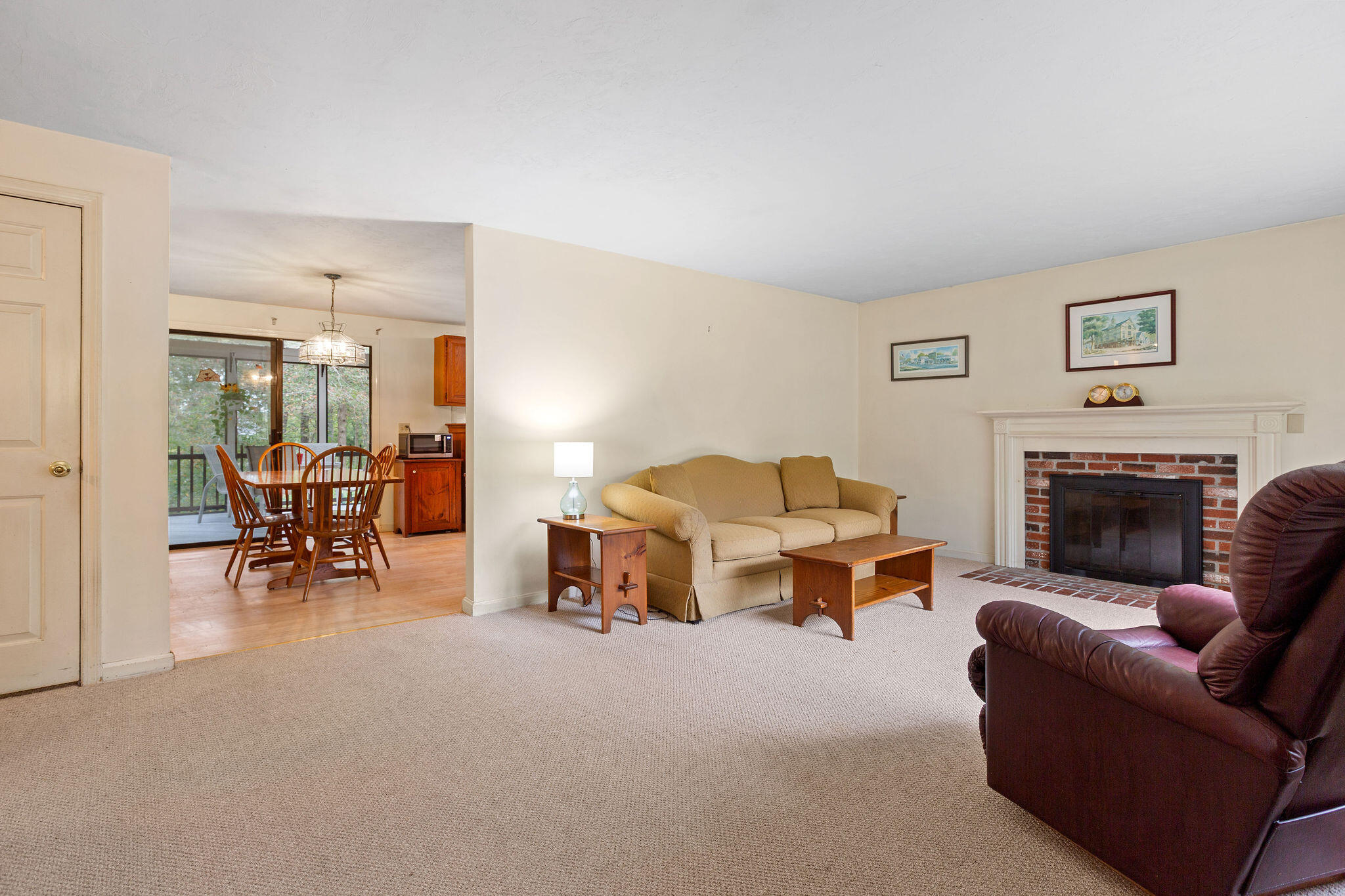 11 Windjammer Road Harwich, MA 02645 - Photo 9 of 29 a living room with furniture and a fireplace