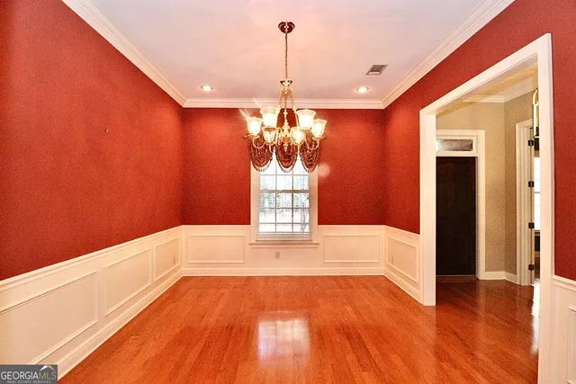 a spacious bathroom with a shower sink and mirror