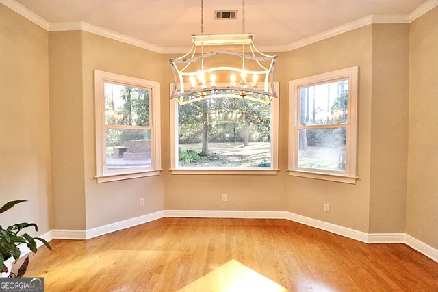 a kitchen with stainless steel appliances granite countertop a stove and a sink