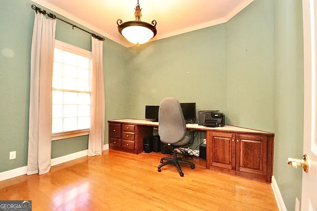 a view of a patio with a table chairs and a backyard