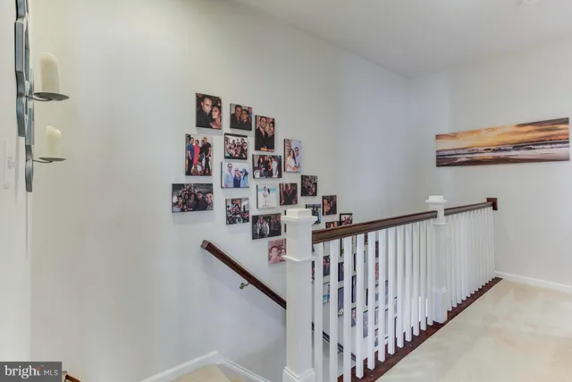 a view of a hallway with workspace