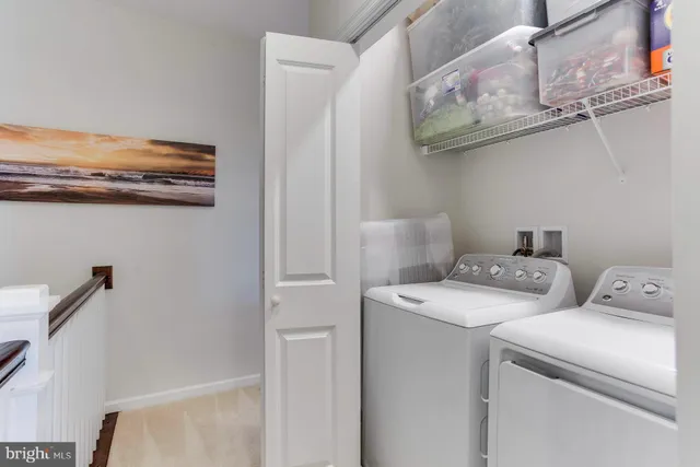 a view of storage and utility room with racks on the wall