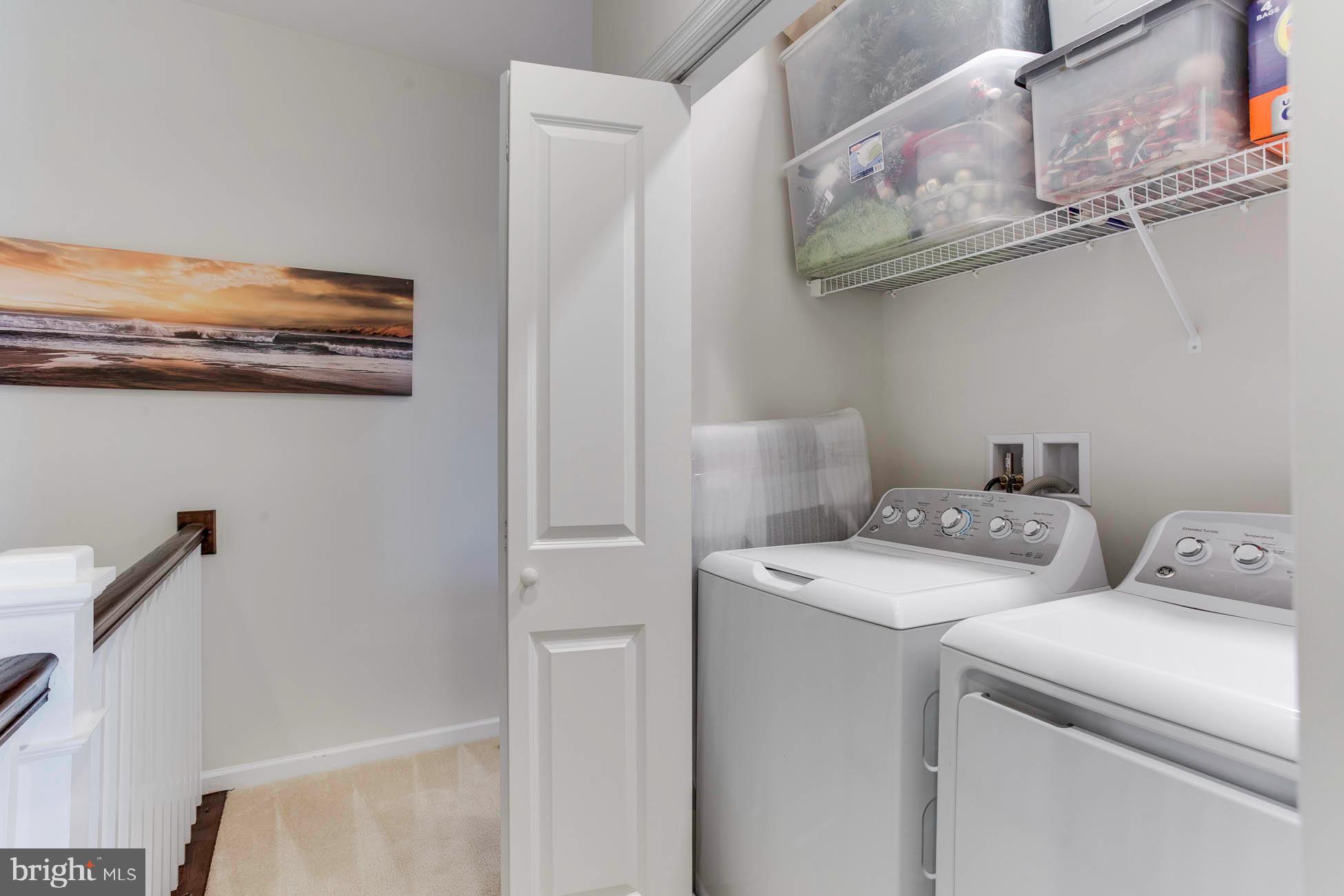 43048 Vernon Ridge Terrace Ashburn, VA 20148 - Photo 25 of 40 a view of storage and utility room with racks on the wall