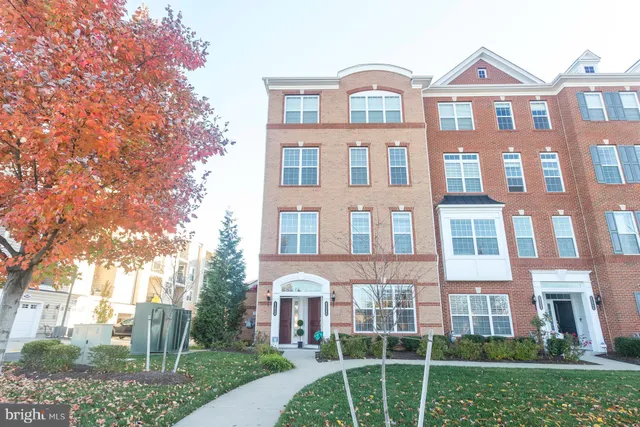 a front view of a building with garden