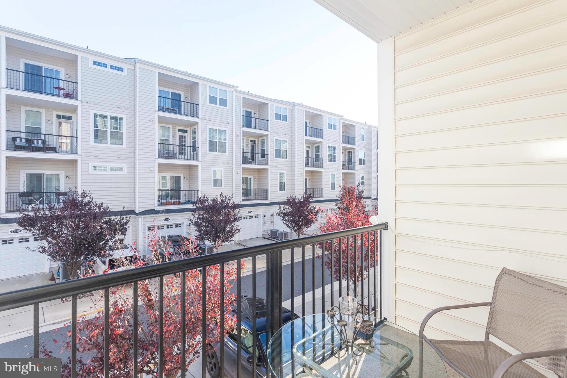 43048 Vernon Ridge Terrace Ashburn, VA 20148 - Photo 32 of 40 a view of a balcony with furniture