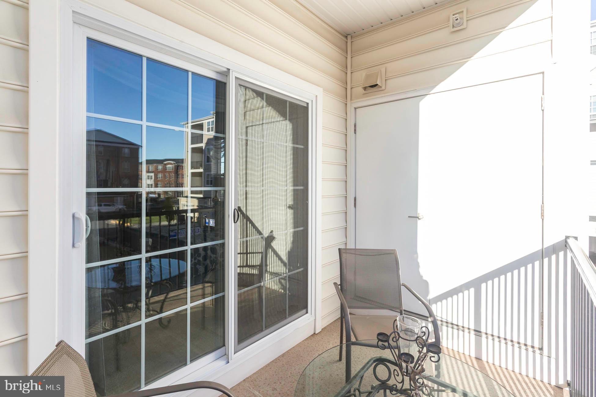 43048 Vernon Ridge Terrace Ashburn, VA 20148 - Photo 34 of 40 a view of a chair and table in the room