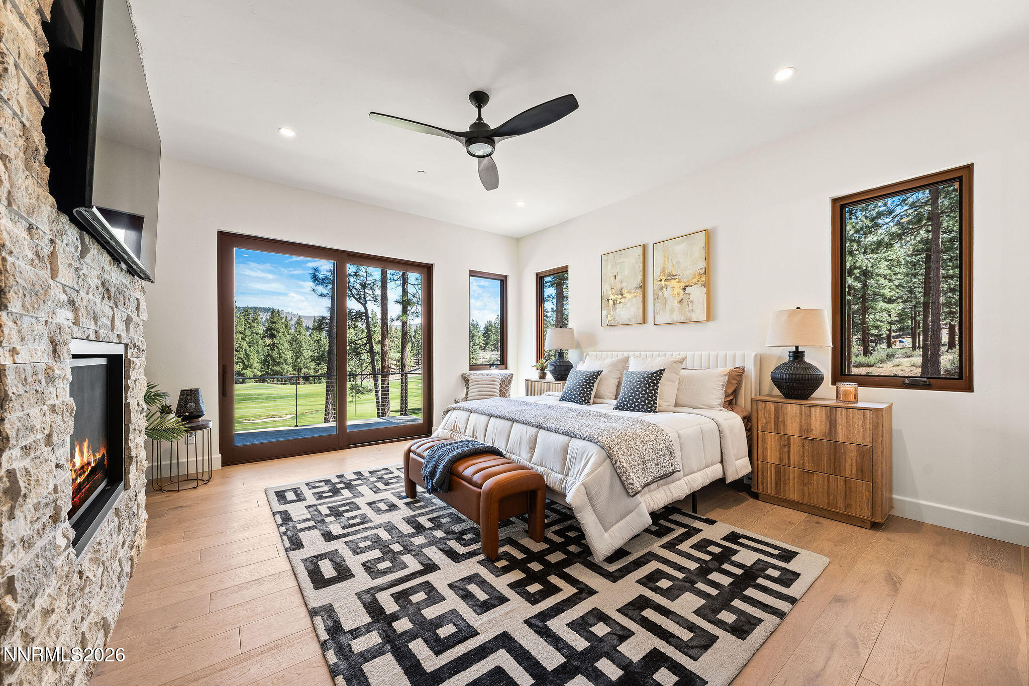 456 Headwaters Way Carson City, NV 89705 - Photo 11 of 40 a bed sitting in a spacious bedroom next to a window