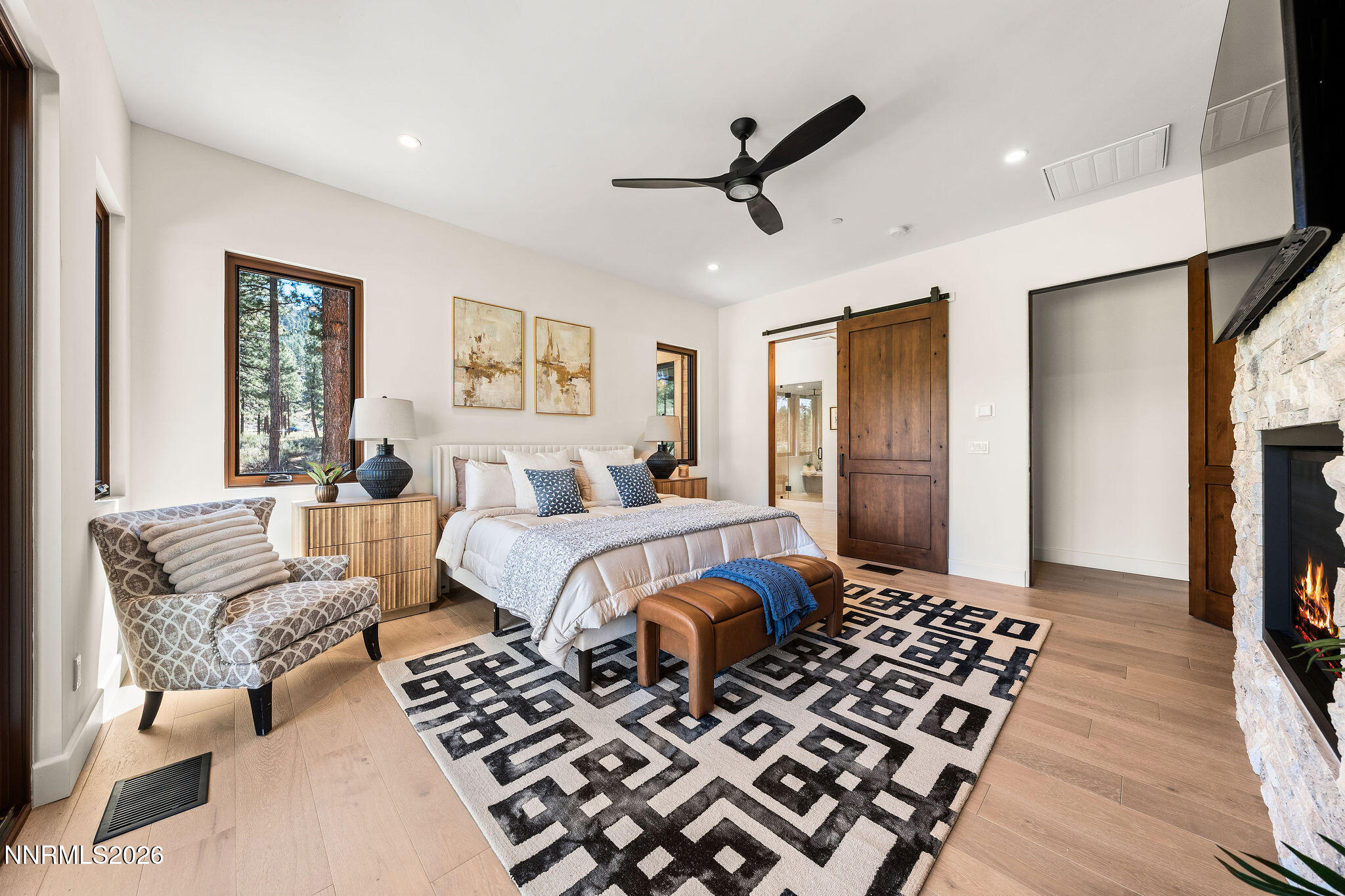 456 Headwaters Way Carson City, NV 89705 - Photo 12 of 40 a bedroom with a bed and a couch