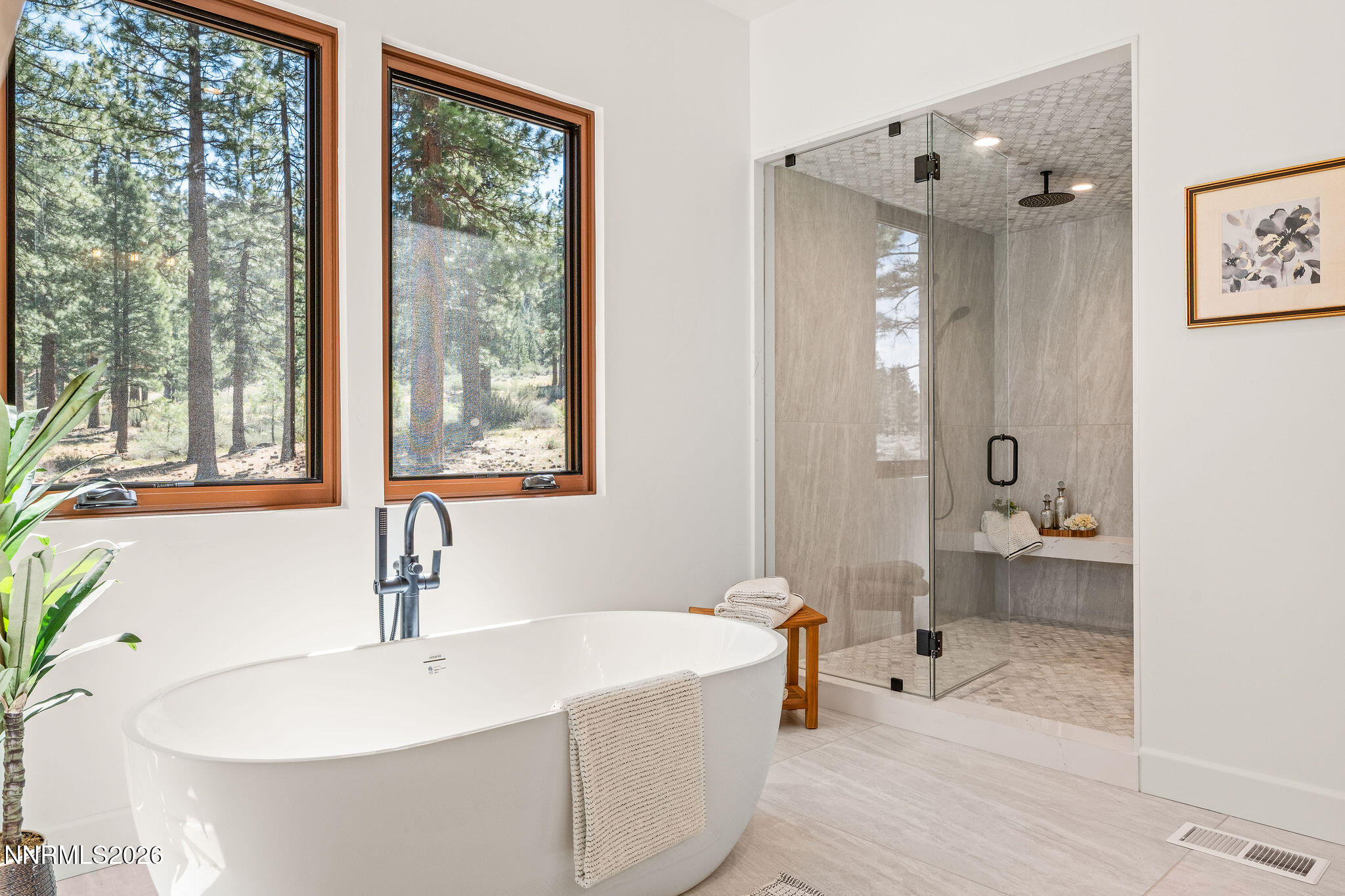 456 Headwaters Way Carson City, NV 89705 - Photo 15 of 40 a bathroom with a tub sink and mirror