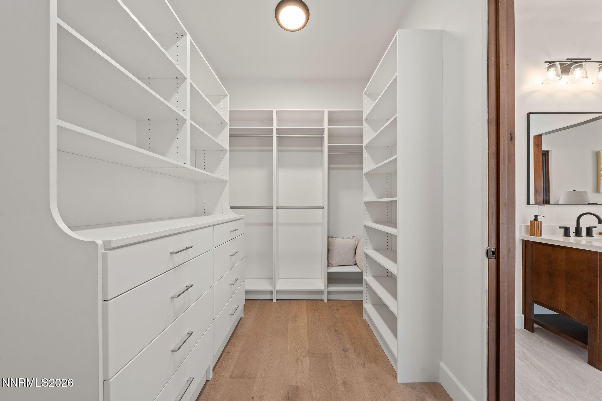 456 Headwaters Way Carson City, NV 89705 - Photo 16 of 40 a view of walk in closet with clothes and shoes