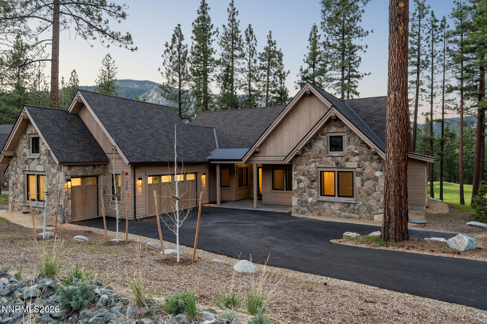 456 Headwaters Way Carson City, NV 89705 - Photo 19 of 40 a front view of a house with garden