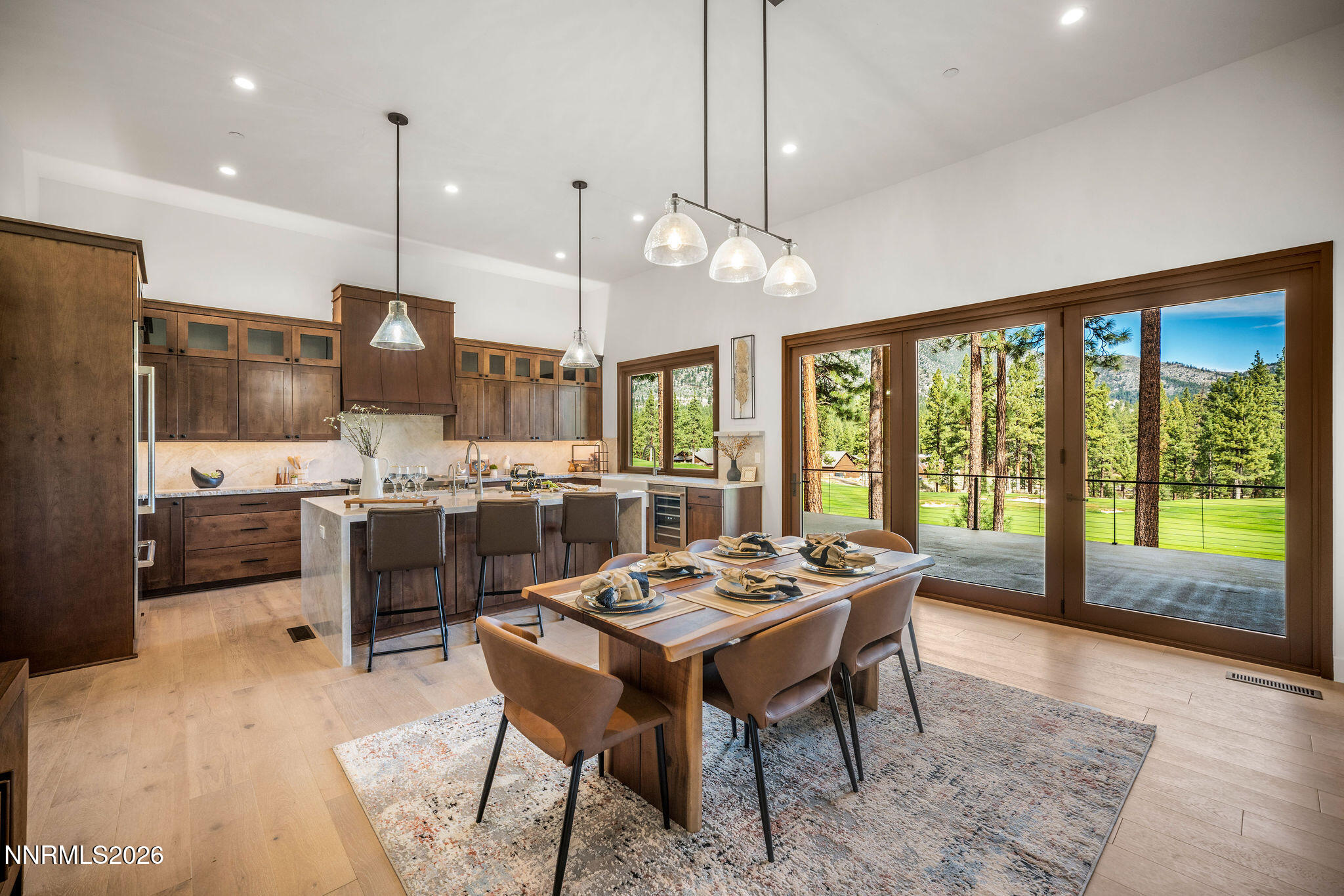 456 Headwaters Way Carson City, NV 89705 - Photo 5 of 40 a large kitchen with a table and chairs