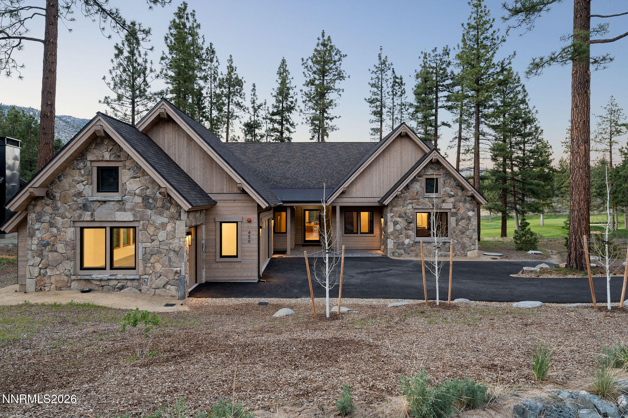 456 Headwaters Way Carson City, NV 89705 - Photo 6 of 40 a front view of a house with a yard