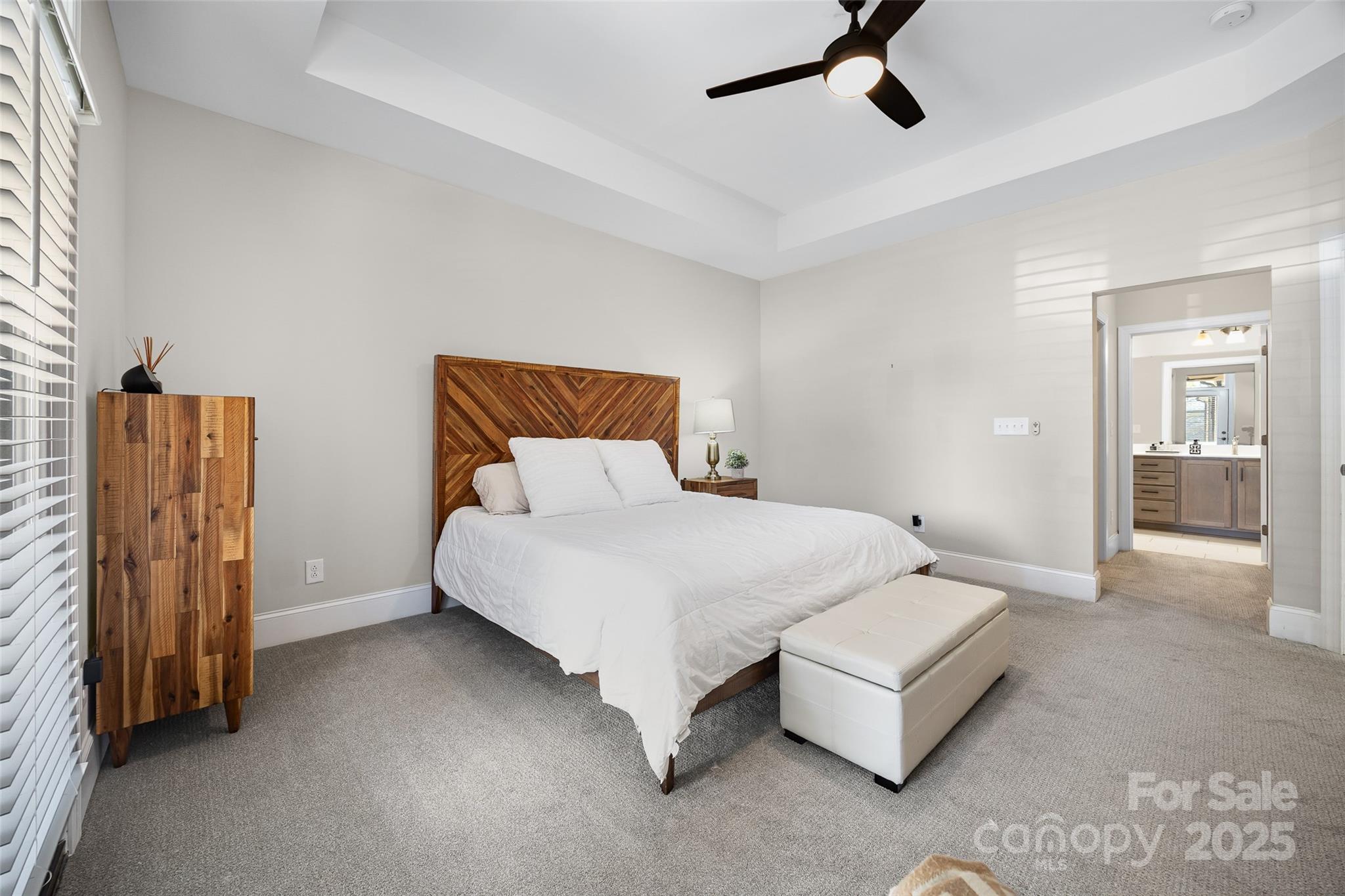 2031 New Style Way Tega Cay, SC 29708 - Photo 12 of 38 a bedroom with a bed and walk in closet