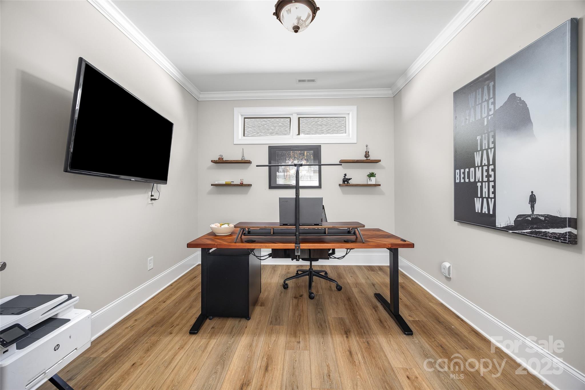 2031 New Style Way Tega Cay, SC 29708 - Photo 18 of 38 a room with furniture and flat screen tv