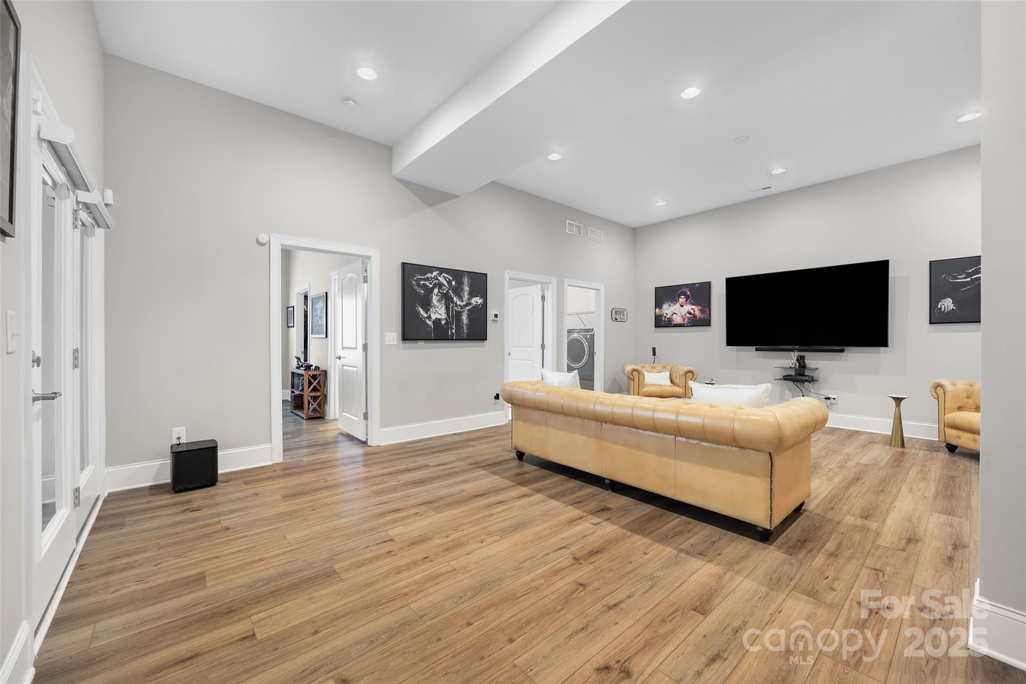 2031 New Style Way Tega Cay, SC 29708 - Photo 21 of 38 a living room with furniture and a flat screen tv