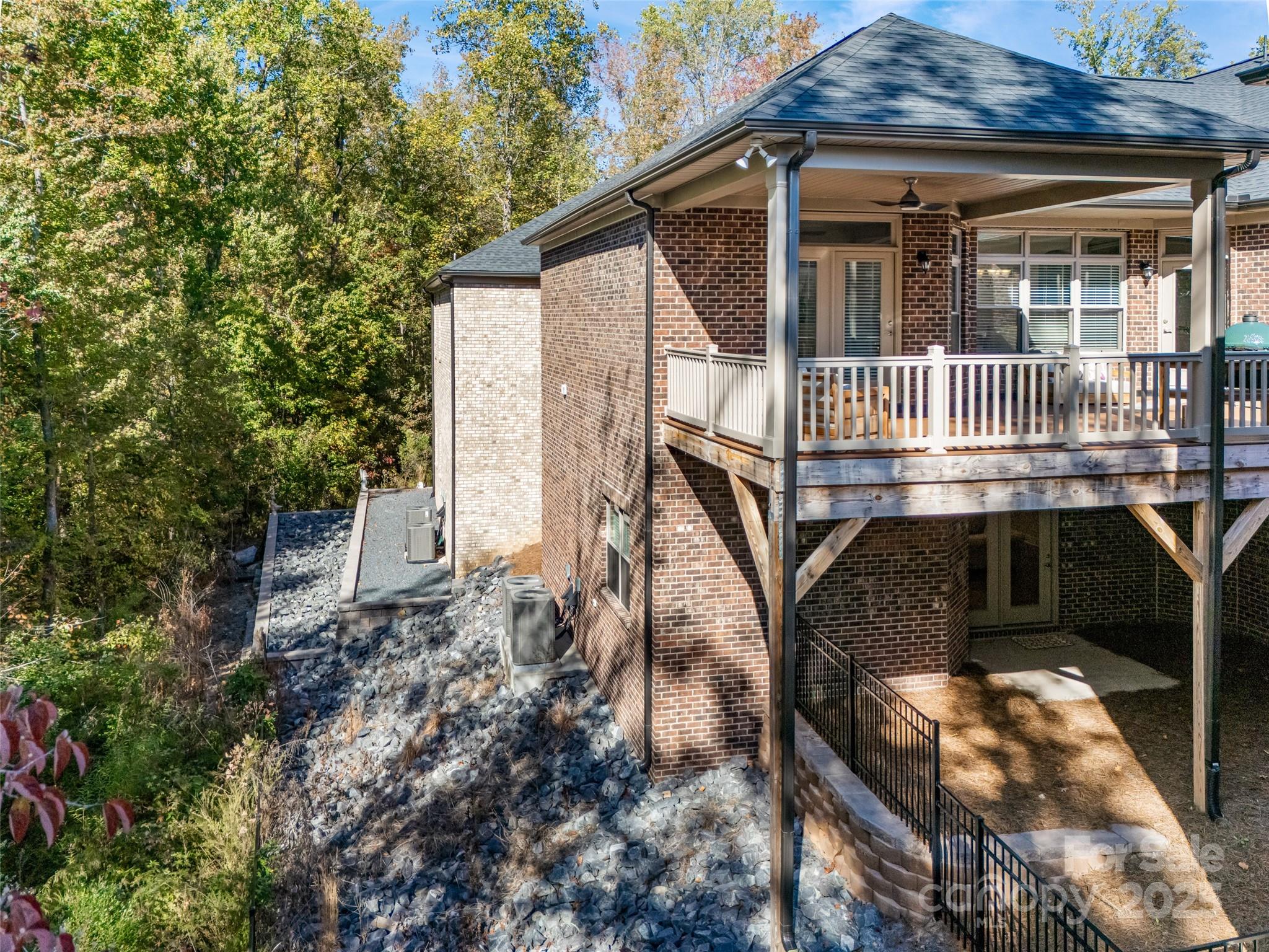 2031 New Style Way Tega Cay, SC 29708 - Photo 30 of 38 a view of a house with wooden fence