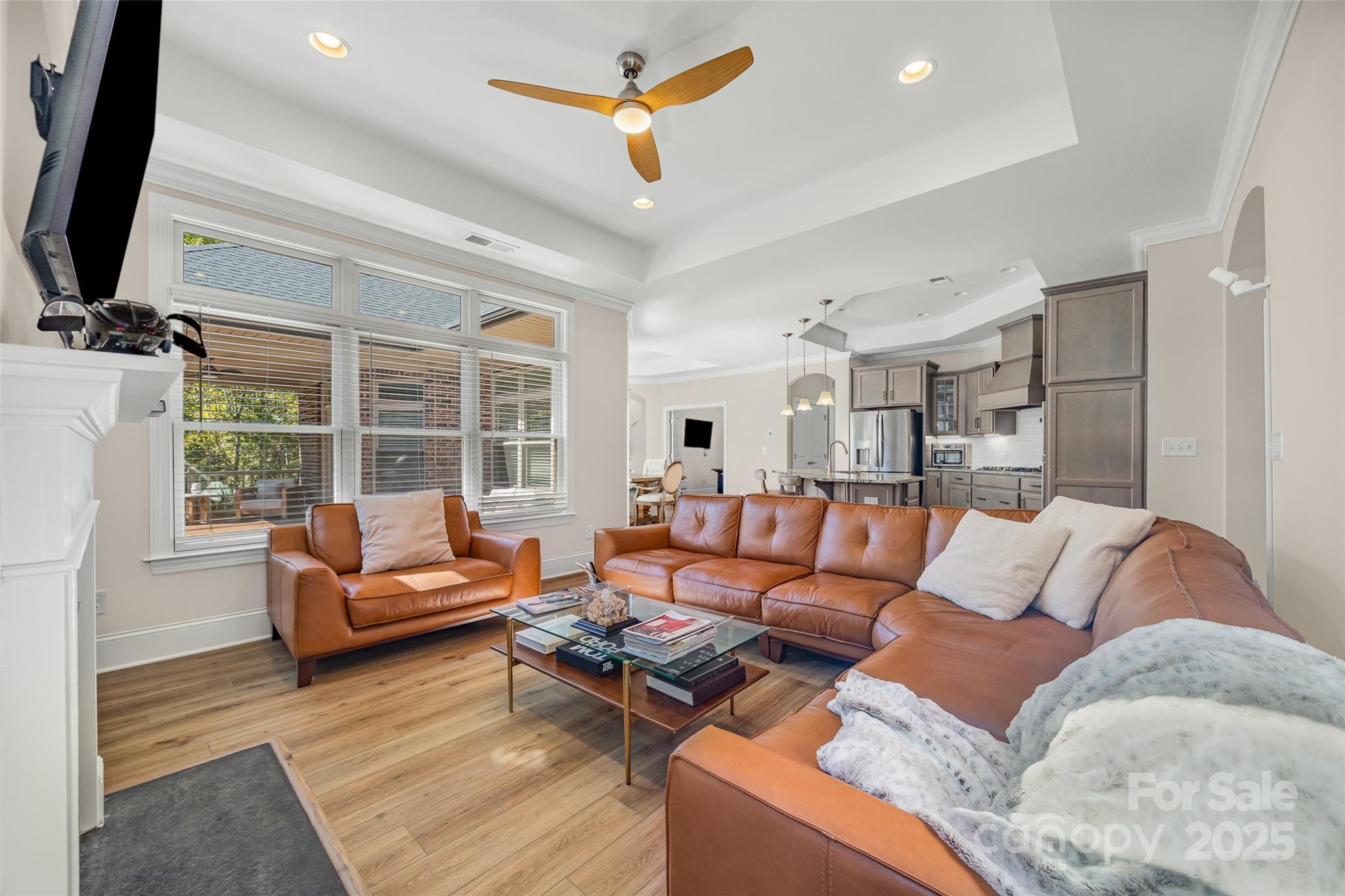 2031 New Style Way Tega Cay, SC 29708 - Photo 7 of 38 a living room with furniture and a flat screen tv