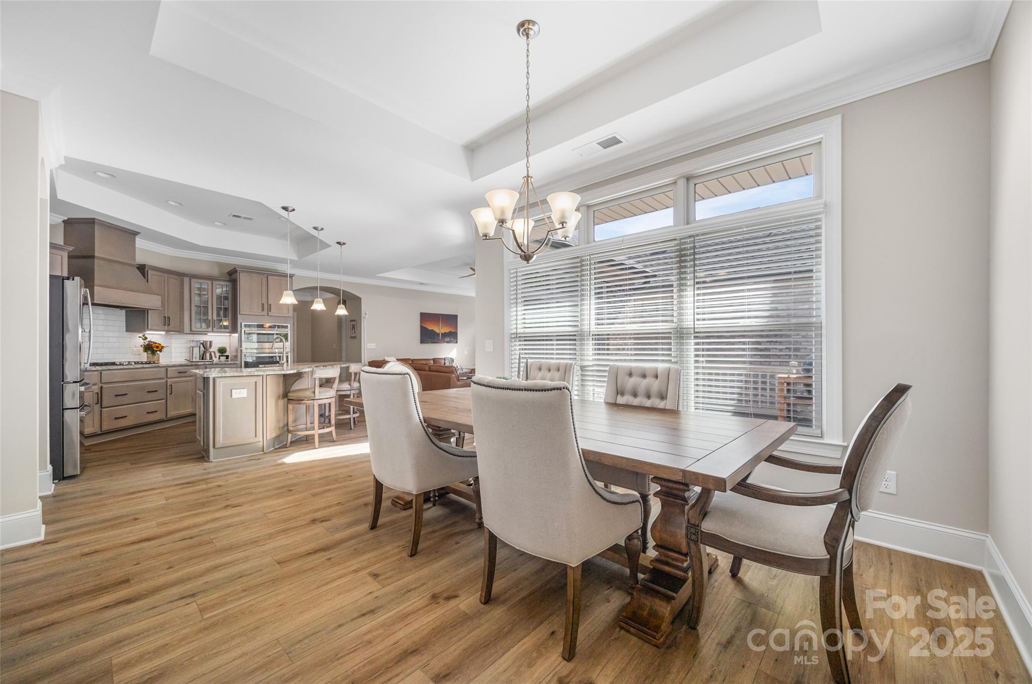 2031 New Style Way Tega Cay, SC 29708 - Photo 10 of 38 a dining room with furniture and window