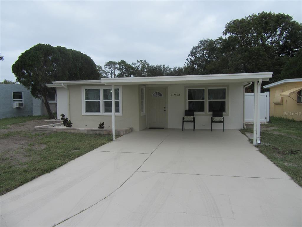 front view of a house with a patio
