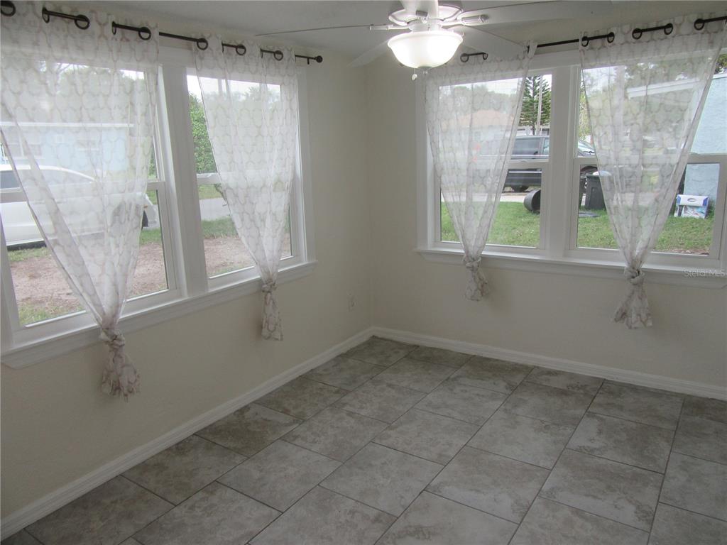 11913 104th Street Largo, FL 33773 - Photo 14 of 34 a view of a livingroom with a window