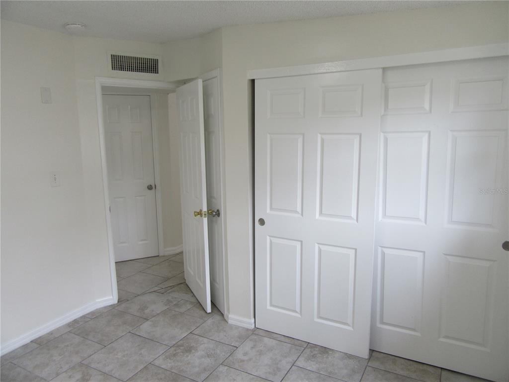11913 104th Street Largo, FL 33773 - Photo 23 of 34 a view of a closet area