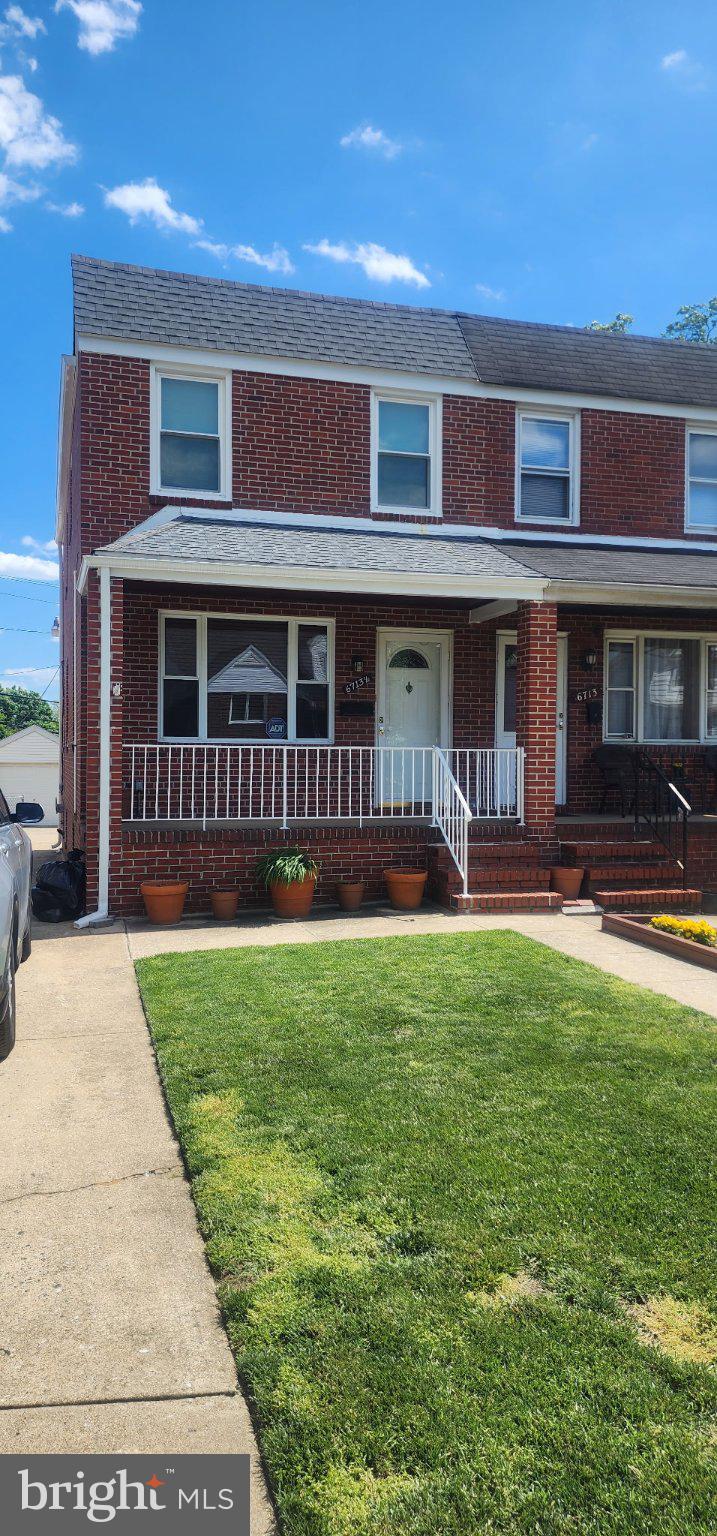 6713 1/2 German Hill Road Baltimore, MD 21222 - Photo 1 of 7 Charming brick home with lush greenery.