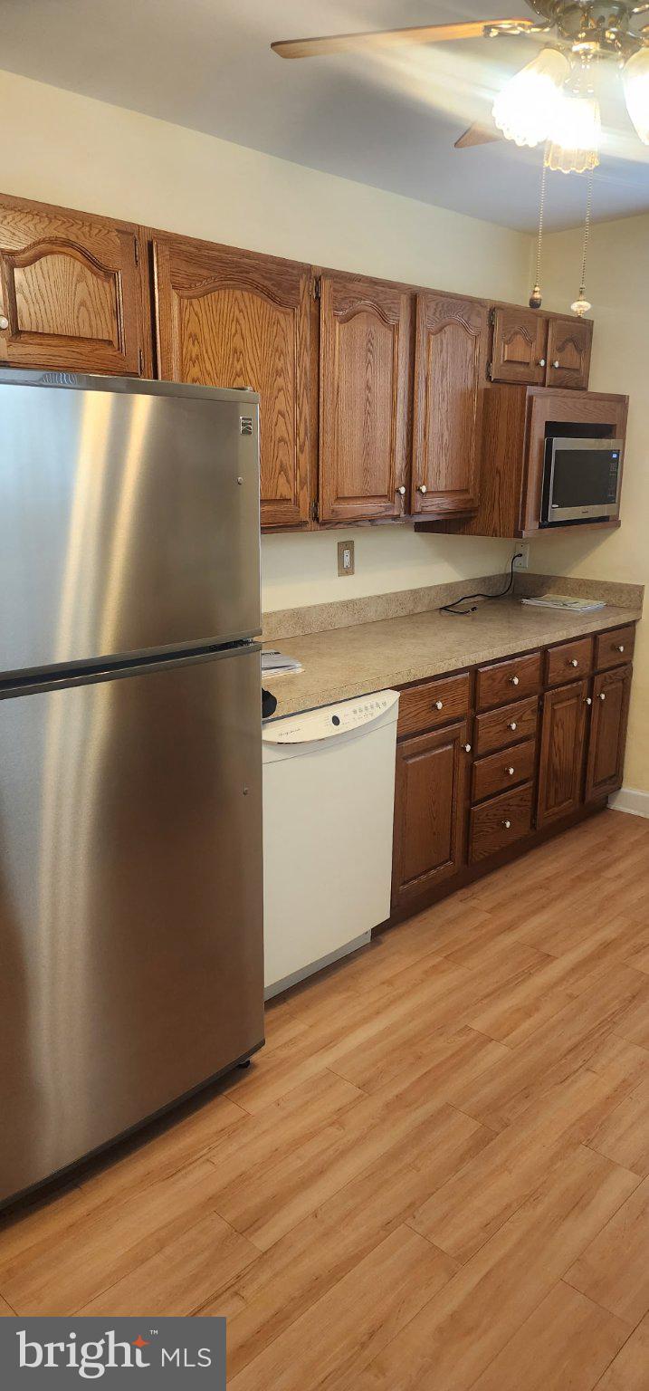 6713 1/2 German Hill Road Baltimore, MD 21222 - Photo 3 of 7 Warm wood tones in a cozy kitchen.