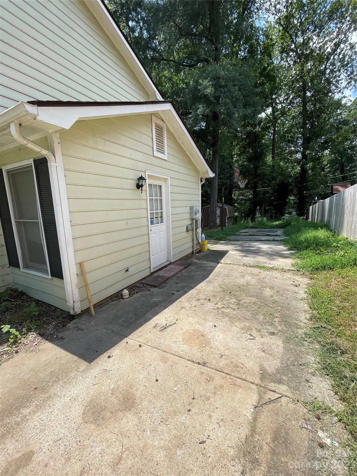 2819 Royal Ridge Lane Charlotte, NC 28212 - Photo 27 of 27 a view of a small house with backyard