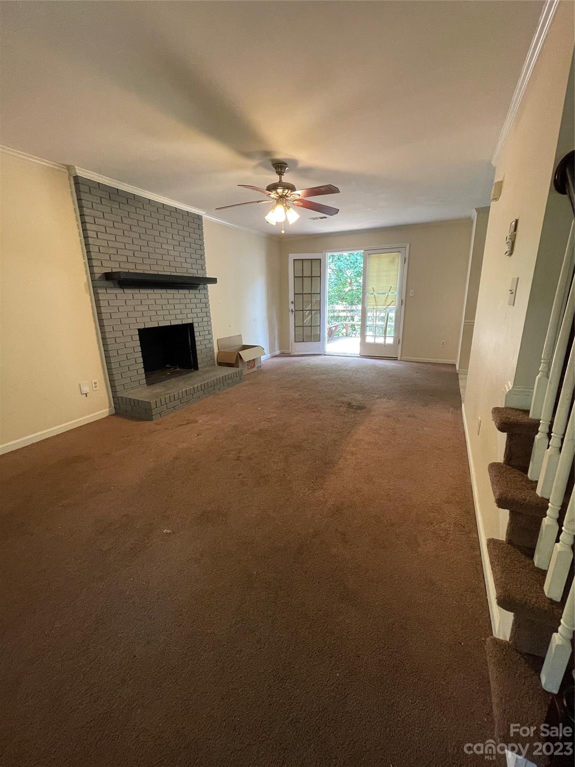 2819 Royal Ridge Lane Charlotte, NC 28212 - Photo 4 of 27 a view of a livingroom with a fireplace