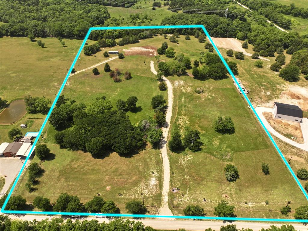 627 Homer Smith Road Van Alstyne, TX 75495 - Photo 1 of 36 a view of swimming pool