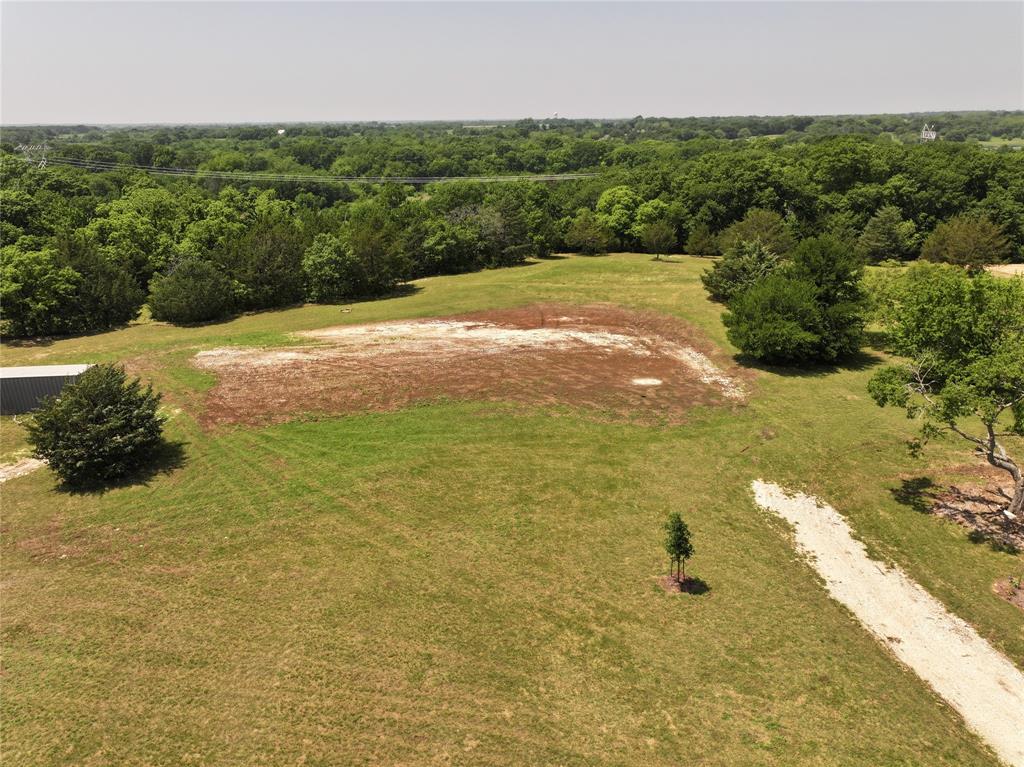 627 Homer Smith Road Van Alstyne, TX 75495 - Photo 17 of 36 a view of outdoor space and yard