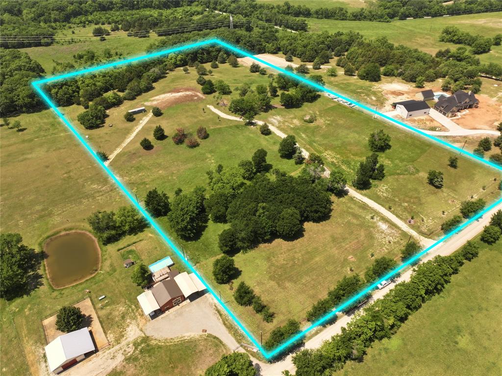 627 Homer Smith Road Van Alstyne, TX 75495 - Photo 5 of 36 a view of a tennis court