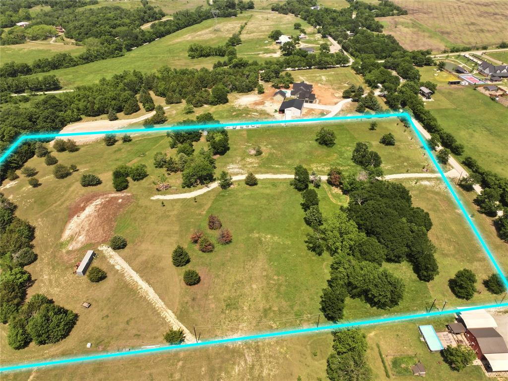 627 Homer Smith Road Van Alstyne, TX 75495 - Photo 7 of 36 an aerial view of residential houses with outdoor space