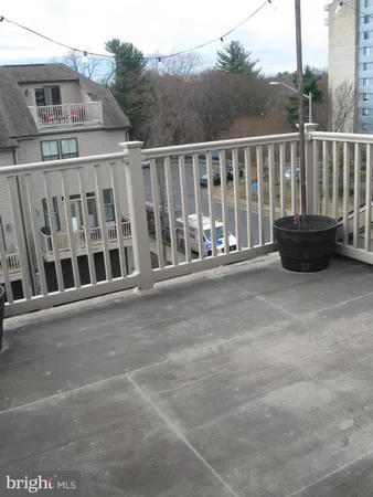 a view of balcony with furniture