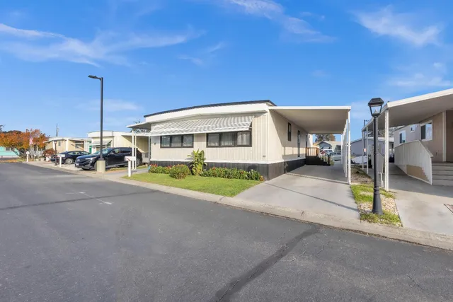 a view of a street with cars