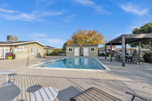 a view of a house with swimming pool