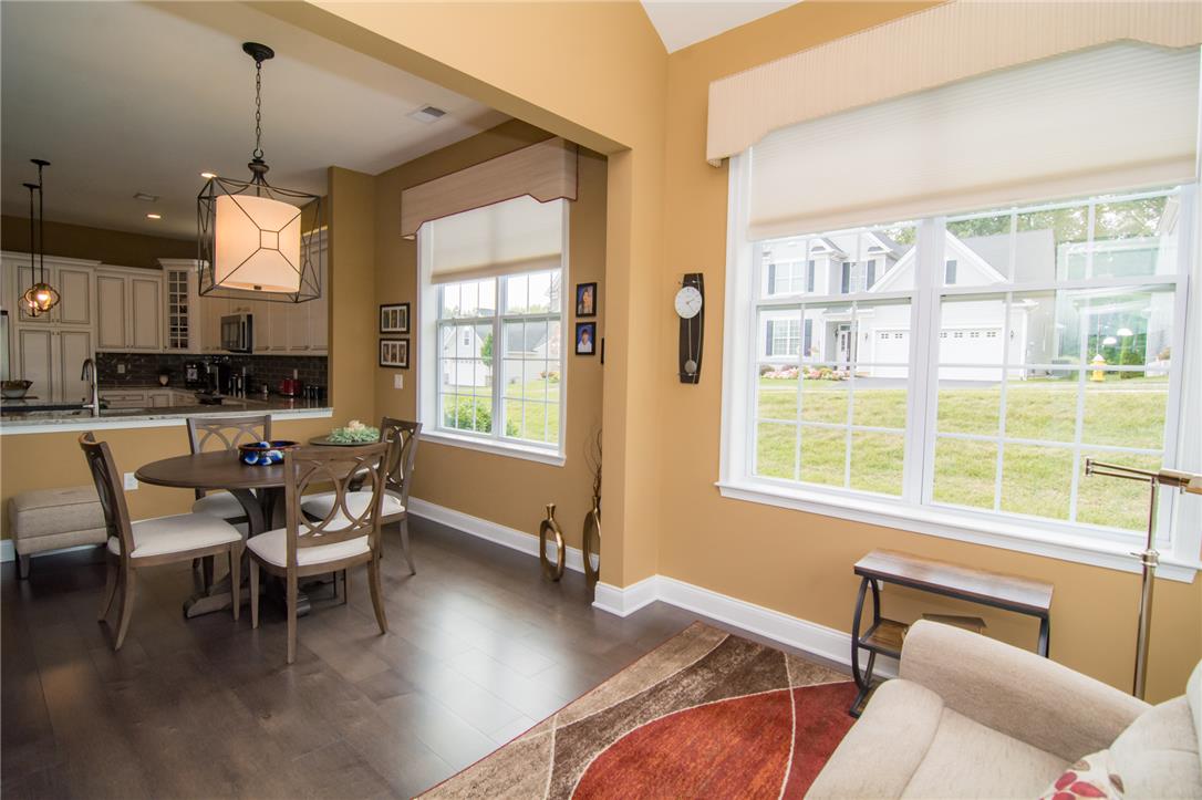 4097 Rutz Lane Allentown, PA 18104 - Photo 57 of 59 An open floor plan connects the sunlit dining area directly to the kitchen.