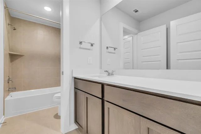 a bathroom with a sink and a bathtub