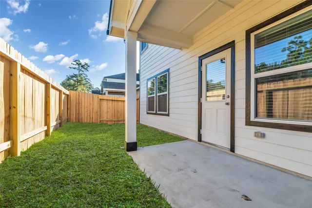 a view of a backyard with garden