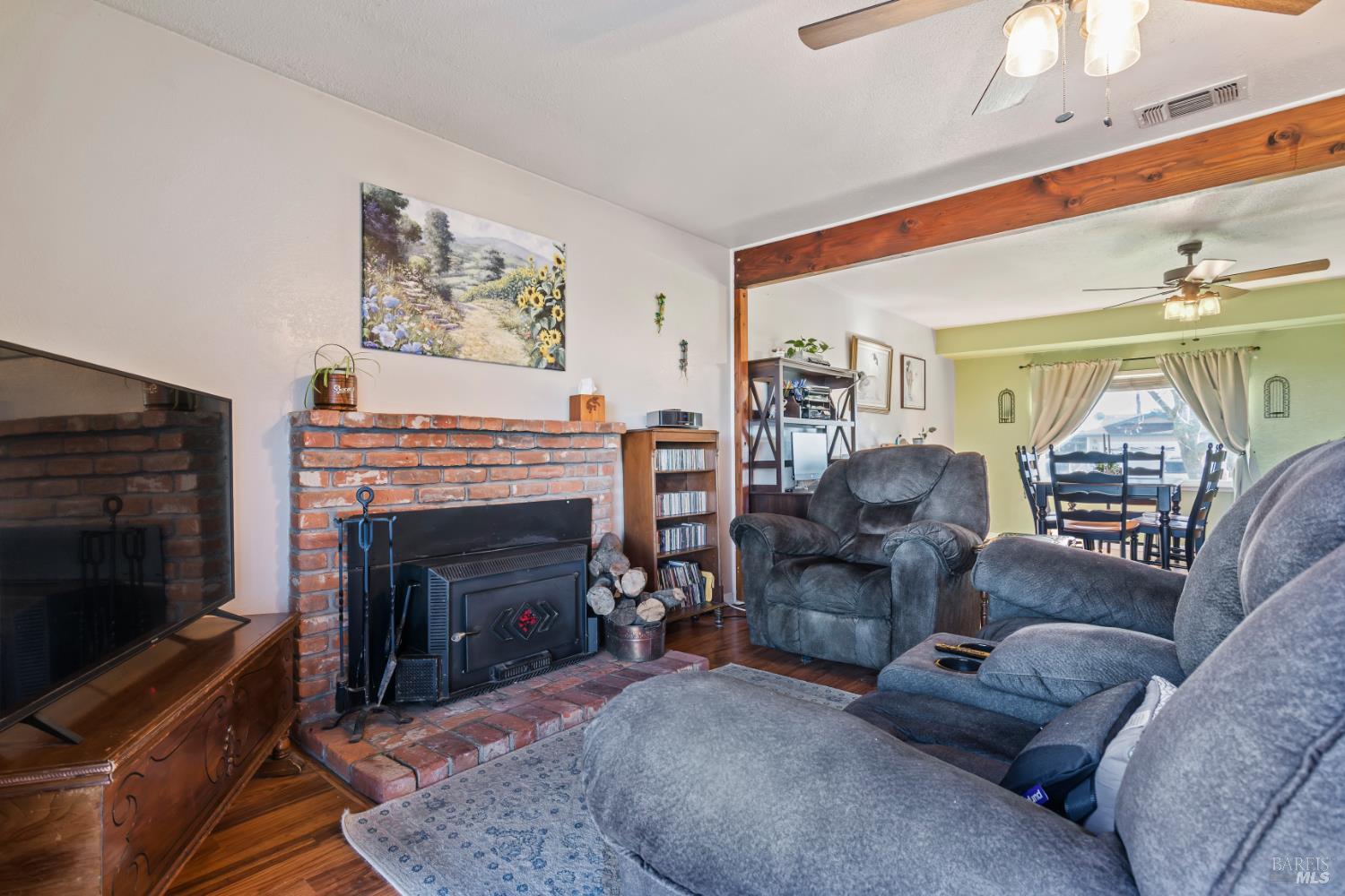 17 Amador Circle Rio Vista, CA 94571 - Photo 13 of 42 a living room with furniture and a fireplace
