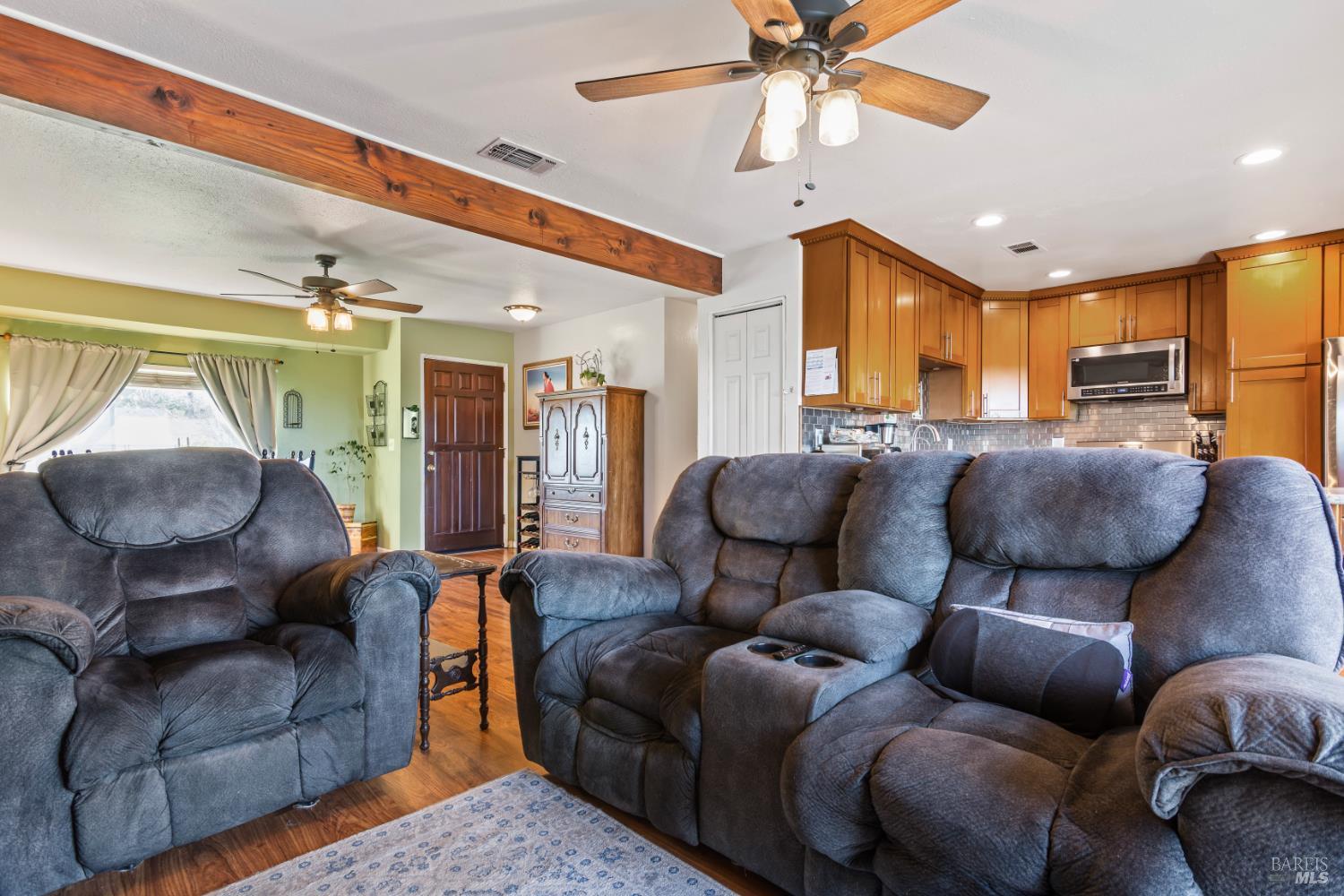 17 Amador Circle Rio Vista, CA 94571 - Photo 14 of 42 a living room with furniture and a chandelier
