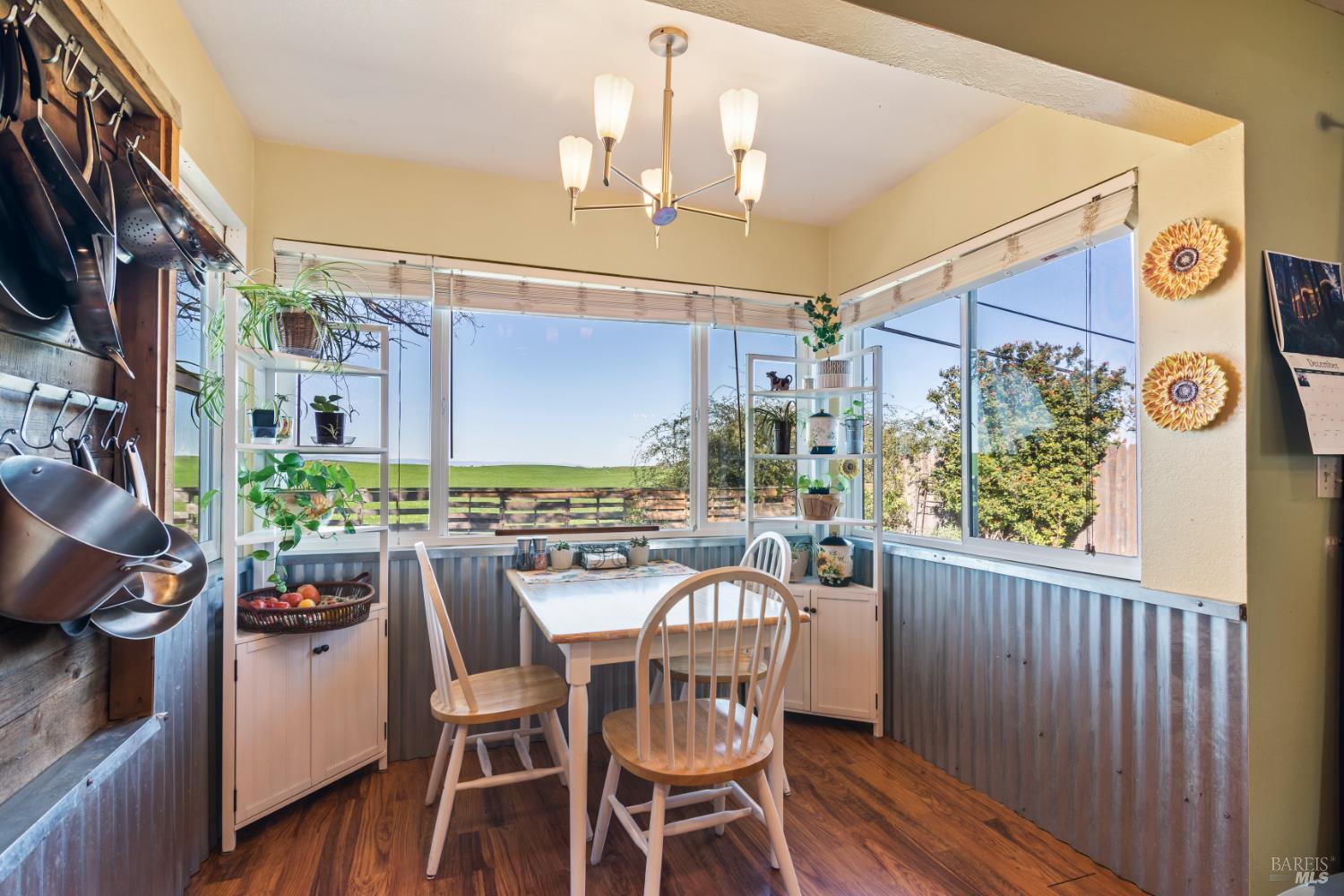 17 Amador Circle Rio Vista, CA 94571 - Photo 20 of 42 a view of a dining room with furniture window and wooden floor