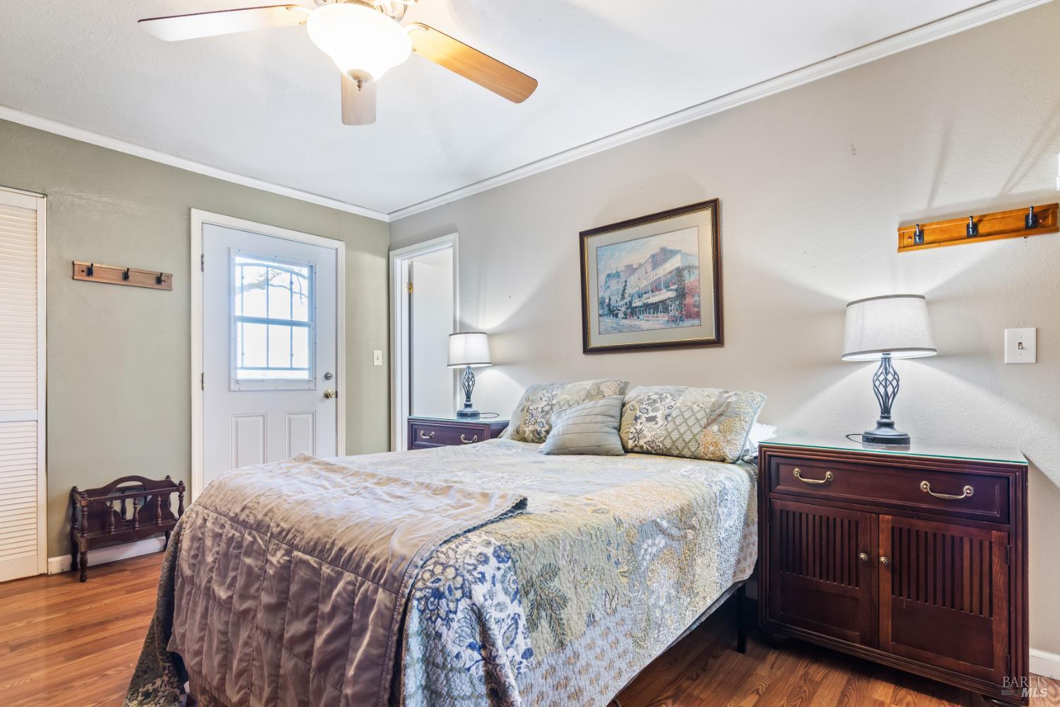 17 Amador Circle Rio Vista, CA 94571 - Photo 27 of 42 a bedroom with a bed and a lamp on dresser