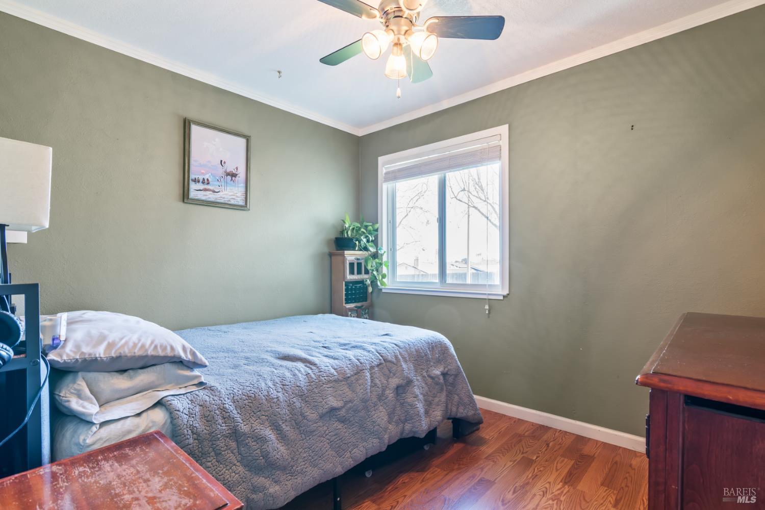 17 Amador Circle Rio Vista, CA 94571 - Photo 32 of 42 a bedroom with a bed and a window