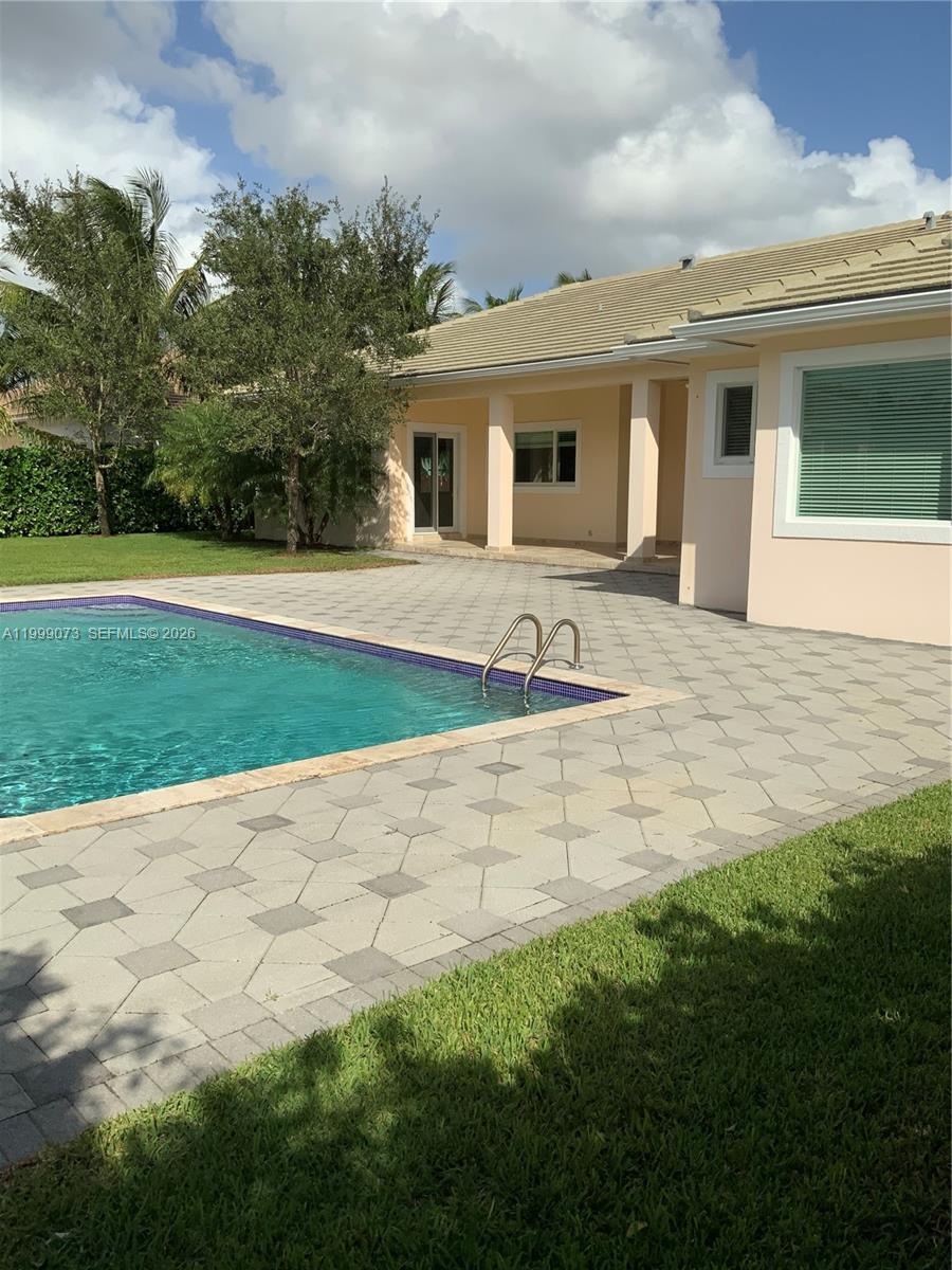 12308 Southwest 94th Place Miami, FL 33176 - Photo 13 of 21 a front view of house with yard