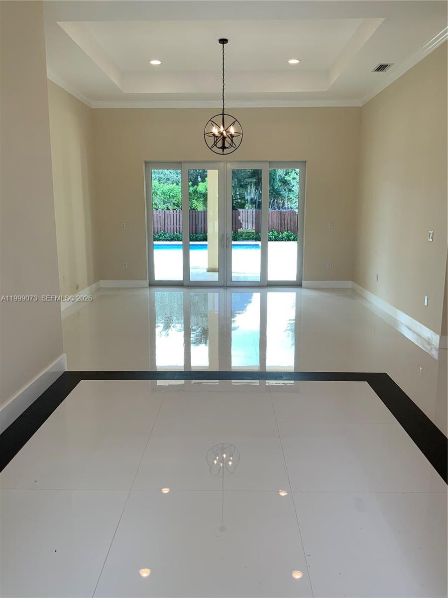 12308 Southwest 94th Place Miami, FL 33176 - Photo 5 of 21 a view of an empty room with a window