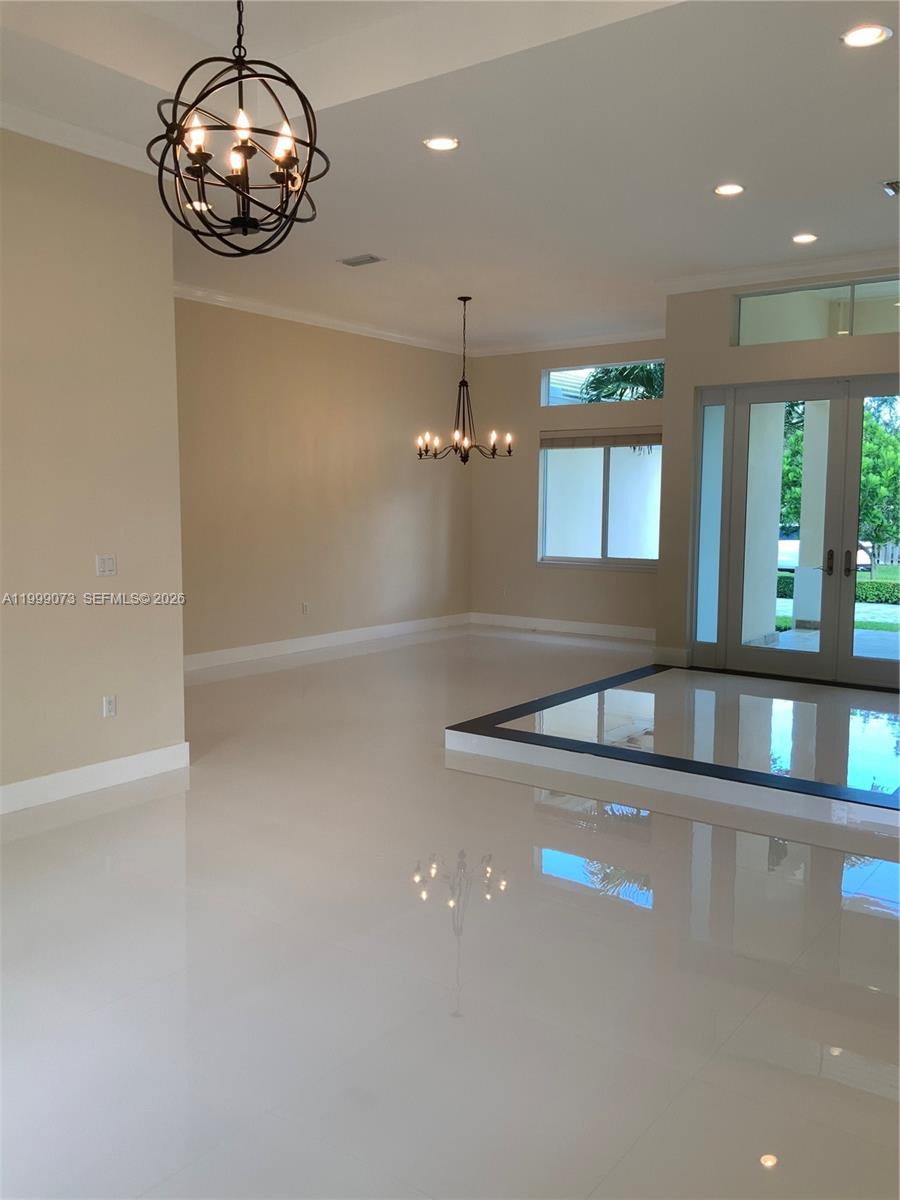 12308 Southwest 94th Place Miami, FL 33176 - Photo 7 of 21 a view of an empty room with a window