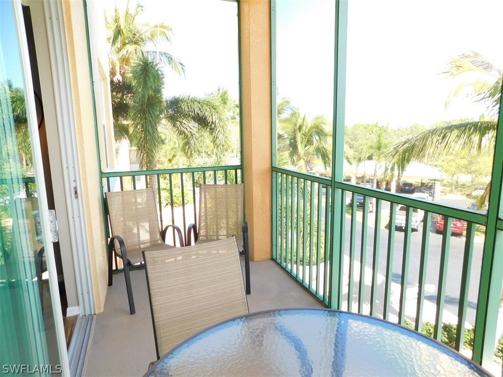 2090 Matecumbe Key Road, Unit 1307 Punta Gorda, FL 33955 - Photo 14 of 25 a view of a balcony with furniture